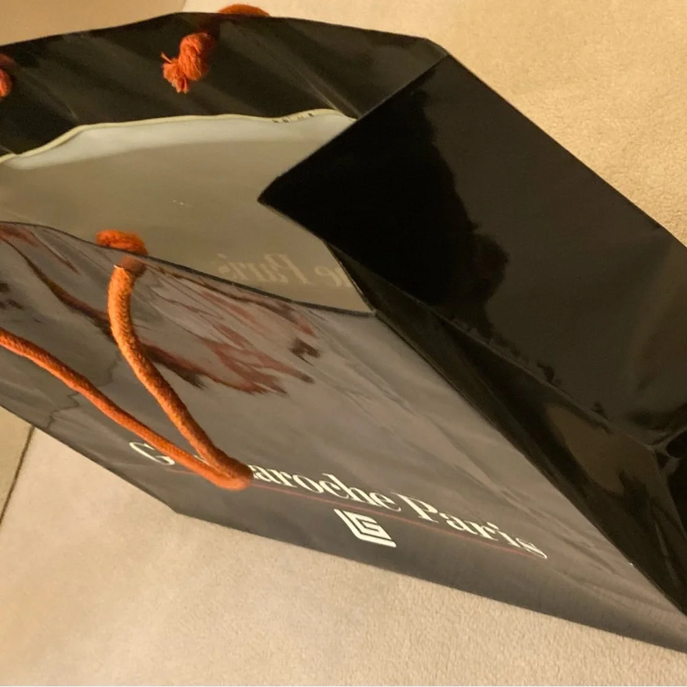 Guy Laroche Paris,black gloss glazed paper branded shopping tote,orange handles